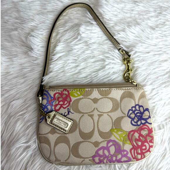 Coach Handbags - COACH Tan Gold Floral Signature Canvas Wristlet